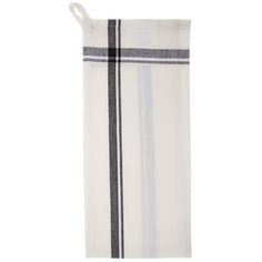 a white and black towel hanging on a wall