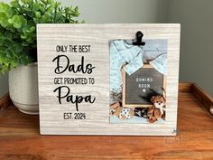 a wooden frame with the words only the best dads get proud to papa est 2012