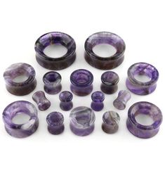 "Amethyst Stone Double Flare Tunnels (0 Gauge - 1 & 1/4\" Inch) - Sold in Pairs 1 Pair (ordering a quantity of 1 gets you a pair) Select size from the drop-down menu Material: Amethyst NOTICE** Each piece will be unique in color & pattern. We do our best to provide you a matching set. Double Flares Sold in Pairs 0G - 1 Inch: 12mm wearable area 1 & 1/8\" - 1 & 1/2\": 13mm wearable area Pick from 0G, 00G, 1/2\", 9/16\", 5/8\", 3/4\", 7/8\", 1 inch, 29mm, 32mm." Ear Tapers, Gold Body Jewellery, Fake Plugs, Plug Earrings, Gold Bodies, Piercing Shop, Pismo Beach