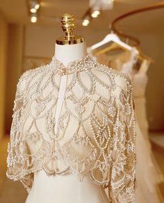 a white dress on display in a store