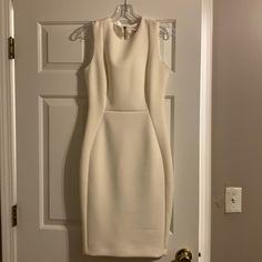 White Calvin Klein Dress Size 4 Worn Once! In Perfect Condition. Thick Satin Material Calvin Klein White Sleeveless Mini Dress, Chic Calvin Klein Cocktail Midi Dress, Fitted White Calvin Klein Mini Dress, Calvin Klein White Fitted Mini Dress, White Fitted Calvin Klein Mini Dress, Fitted White Calvin Klein Midi Dress, Calvin Klein White Sheath Dress, Calvin Klein White Fitted Midi Dress, Elegant Calvin Klein Midi Cocktail Dress