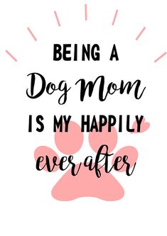 a pink paw print with the words being a dog mom is my happily ever after