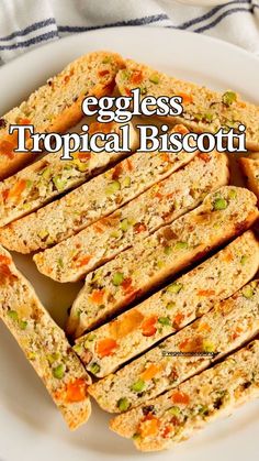 an eggless tropical biscotti sandwich on a white plate with text overlay