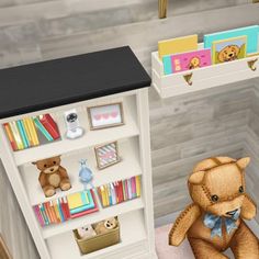 a brown teddy bear sitting next to a book shelf