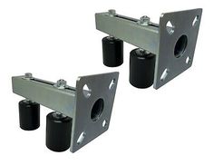 two metal brackets with black wheels on white background