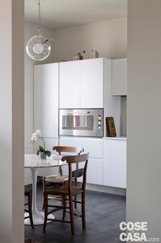 the kitchen is clean and ready to be used as a dining room or office space