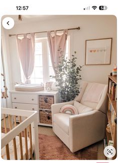 a baby's room with a crib, rocking chair and dresser in it