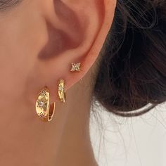 Starburst Gold Huggie Earrings Small – ANETT Two Piercings Ear Ideas, Ear Piercings Gold, Gold Earring Stack, Earrings Starburst, Good Earrings, 3 Piercings, Hold Earrings, Earrings Piercings, Earring Inspo