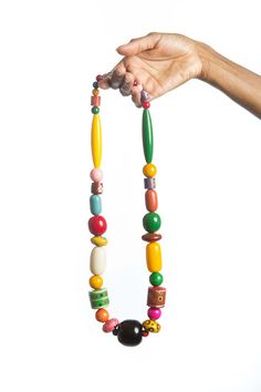 "Stunning unique, hand painted chunky wood bead necklace.  The necklace is designed using hand painted beads, sourced from Barcelona Spain.  Featuring colorful beads and an art deco design, this necklace is the perfect gift for the favorite woman on your gift list.   *Ready to ship *Bold and beautiful *Length: 15\" Image colors may appear brighter/darker on your computer monitor depending on resolution. **Please read our shipping and other shop policies before placing an order.  **Special offer: Unique Multicolor Wooden Beads Necklaces, Unique Multicolor Wooden Beads, Multicolor Wooden Beads, Colorful Wooden Beaded Necklaces, Artisan Multicolor Wooden Beaded Necklaces, Artisan Multicolor Wooden Beads Necklace, Multicolor Hand Painted Beaded Bohemian Necklace, Multicolor Hand Painted Bohemian Beaded Necklace, Bohemian Multicolor Hand Painted Beaded Necklaces