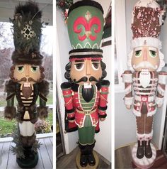 three different types of nutcrackers on display in front of a door and window