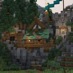 a small house built into the side of a mountain with trees and bushes around it