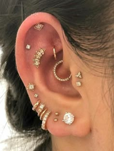 a woman with ear piercings on her ears