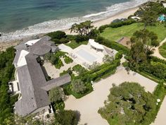 an aerial view of the house and its surrounding grounds