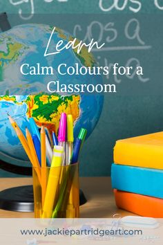 a desk with books, pencils and a globe on it that says learn calm colours for a classroom