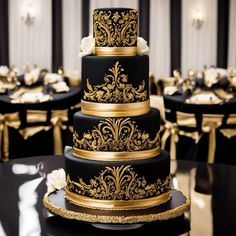 a black and gold wedding cake with white flowers on it's tiered stand