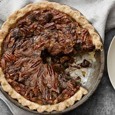 a pecan pie with one slice taken out