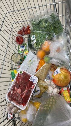 a shopping cart filled with lots of food