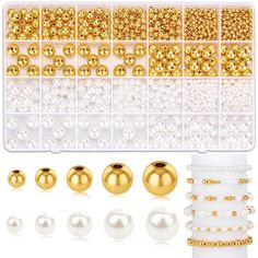 gold and white beads in a plastic container with pearls on the side, and several different sizes