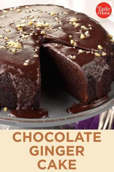 a chocolate ginger cake on a plate with the words chocolate ginger cake in front of it