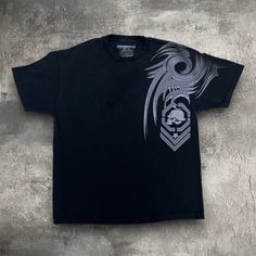 Insane Rare Y2k Era Metal Mulisha Tee With An Fire Tribal Graphic. Similar Brands Like Southpole, Affliction, Tapout, And Mma Elite. Fits Size Xl Made From 100% Cotton Feel Free To Send A Message With Any Questions Or To Ask About International Shipping Rates. Black Skull Print Shirt For Streetwear, Black Shirt With Skull Print For Streetwear, Black Short Sleeve Top With Skull Print, Black Punk Shirt With Skull Print, Edgy Black Shirt With Skull Print, Black Band Merch Shirt With Skull Print, Grunge Tee, Dark Spirit, Metal Mulisha