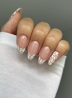 In this blog post, we’ve curated 34 elegant, playful, and utterly chic white nail ideas that will transform your fingertips into works of art. Whether you’re a fan of minimalist sophistication, intricate floral details, or a sprinkle of glitter, there’s a white nail design here to suit every style and mood. From glitter star party nails to delicate white geometric designs, you're sure to find a white nail design you love! White Nails With Designs, Minimalist Nail Art, Almond Nails Designs, White Nail Designs, Minimalist Nails, Chic Nails, Best Acrylic Nails, Square Nails