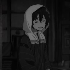 an anime character wearing a hoodie and looking at the camera while standing in a dark room