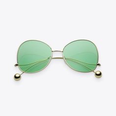 A classic yet glamorous look Merge the past with the present in a head-turning look with these Gold & Green Women’s Retro Butterfly Sunglasses from zero UV. Lightweight yet heavy on UV protection, get the look this summer (or anytime of year) with these classic shades. Old-school glam For a great way to mix it up A change in style is great Break from the traditional monotony of blacks and greys in yoru sunglass game and throwback to retro days and style with these vintage-inspired sunglasses. It’s in the details From the curved butterfly shape of the lens frames to the ball-bearing ends of the arms, our Gold & Green Women’s Retro Butterfly Sunglasses are designed for subtle glam. Crafted to last These shades are made with a metal-based frame, noise pieces, metal arms, metal hinges, Cheap Green Sunglasses For Summer, Cheap Modern Shield Sunglasses For Parties, Cheap Green Sunglasses With Mirrored Lenses, Modern Shield Sunglasses For Parties, Cheap Modern Shield Sunglasses For Party, Cheap Green Beach Sunglasses, Affordable Green Sunglasses With Mirrored Lenses, Cheap Green Casual Sunglasses, Luxury Green Sunglasses For Outdoor