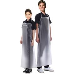 two people wearing aprons standing next to each other