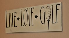 a sign on the wall that says live love golf