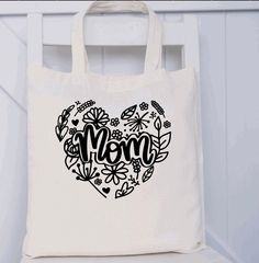 "Mom canvas tote.  This tote is on a 100% cotton bag with two straps measuring 16\" in height and 15\" in width.  The image on this bag is made from black vinyl that will last!  The image can be made in a different color if you would like. Just send us a message and let us know if you would like a different color vinyl than black!" Mom Bag, Mom Bags, Monogram Tote, Personalized Cups, Letter Art, Market Bag, Canvas Tote Bag, Cotton Bag