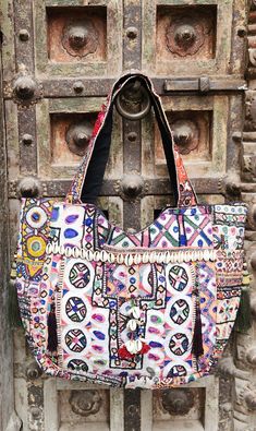 About bag  Indo-gypsy fusion, everyday use hand bag made from Banjara fabrics sourced from Vintage tribal costumes of regions of Rajastan and Gujarat. These are embellished with light catching coins, and intricate bead work tassels. Company details:  Company name: Houseoftextile  Contact number: +919784447473  Email id: houseoftextile77@gmail.com  Shipping & custom : Delivery through one of the finest service providers : Skyway, Fedex, UPS  And DHL. Any local taxes\custom has to be paid by clien Bohemian Bag, Bohemian Bags, Email Id, Evening Clutch Bag, Evening Clutch, Gmail Com, Clutch Handbag, Hand Bag, Bag Making