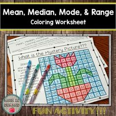 the color by number worksheet is shown with markers and pens