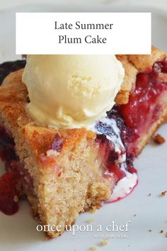 a piece of cake with ice cream on top is sitting on a plate and has the words, late summer plum cake