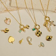 Effortlessly chic and versatile, Our Personalised Charm Necklaces is one of the most coveted pieces. Wear it alone, or layer it with our other necklaces to add a bit of glamour to your everyday outfit and for special outfits.  Your choice of gold-plated lowercase initials ( a-z ) or uppercase initials (A -Z ) or birthstone(s), and other charms ( see photos ) that hangs on a delicate 18-inch cable chain with lock clasp, you can also add one or up to 3 charms to your necklace. D E T A I L S - Mate Cheap Elegant Charm Necklace For Birthday Gift, Dainty Charm Necklace For Birthday, Gold Charm Necklace For Everyday - May Birthstone, Pearl Charm Jewelry For May Birthstone Gift, May Birthstone Jewelry With Pearl Charm As Gift, Elegant Charms Jewelry For Birthday, Dainty Clavicle Chain Charm Necklace For Birthday, Dainty Clavicle Chain Necklace For May Birthstone, Elegant Tarnish Resistant Necklace For Birthday