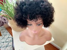 A curly short bob wig is a versatile and stylish hairpiece that can transform your look in an instant. Perfect for those who want to experiment with their hairstyle without the commitment, this wig features soft, bouncy curls that add volume and texture. The bob cut is flattering for various face shapes, providing a youthful appearance that is both chic and sophisticated. Made from high-quality synthetic or human hair, the wig is designed to be lightweight and comfortable for all-day wear. Whether you're dressing up for a special occasion or looking to enhance your everyday style, a curly short bob wig can give you that fun and trendy vibe you desire. With its easy maintenance and ability to withstand styling tools, this wig is a go-to choice for fashion-forward individuals seeking a new l Soft Bouncy Curls, Curly Short Bob, Curly Short, Short Curly Bob, Bouncy Curls, Short Bob Wigs, Bob Wig, Bob Cut, Short Bob