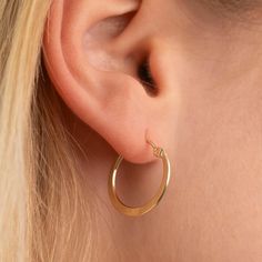 Meet our Gold Flat Hoops! Substantial, but light weight and with a durable clasp. 14k Gold Filled Clasp Closure Available in Hoop Diameter 18mm, 22mm, 25mm, and 35mm Dainty Hypoallergenic Hoop Earrings For Formal Occasions, Dainty Hypoallergenic Hoop Earrings For Formal Events, Classic Single Earring For Everyday, Classic Round Hoop Earrings For Everyday, Classic Round Hypoallergenic Huggie Earrings, Classic Small Hoop Jewelry For Everyday, Classic Adjustable Hoop Earrings For Everyday, Classic Hypoallergenic Huggie Jewelry, Classic Everyday Hypoallergenic Huggie Earrings