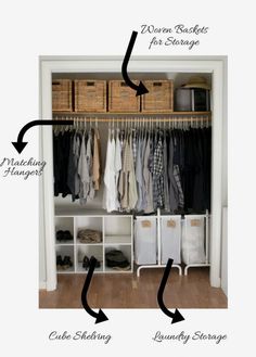 an organized closet with clothes hanging on the shelves and baskets below it, labeled organizing