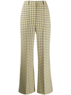 Victoria Beckham's virgin wool high-waisted flared trousers present a strong case of business in the front, party in the... pattern. In a bright mustard and black houndstooth check, these trousers are guaranteed to help you stand out in a crowd. Nothing says "I have arrived" like a bold power trouser. Featuring a high waist, a flared style and a houndstooth pattern. Funky Clothing, I Have Arrived, Cloth Collection, Flair Pants, Celebrity Closets, Victoria Beckham Outfits, Yellow Pants, Funky Outfits, Flared Trousers