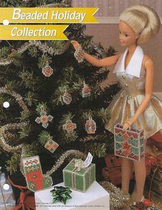 a barbie doll is decorating a christmas tree and presents for the holiday season,