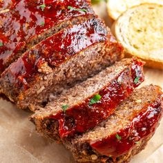 sliced meatloaf on a plate with parsley