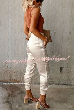 Beige Pants For Night Out In Spring, Casual Summer Pants For Going Out, Casual Leather Pants For Going Out, Summer Going-out Pants, Stretch Pants For Going Out In Summer, Casual Bottoms With Pockets For Going Out, Summer Stretch Pants For Going Out, Spring Bottoms With Pockets For Going Out, Non-stretch Bottoms For Going Out In Spring