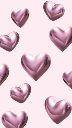 many shiny hearts on a pink background