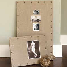 an old photo frame with pictures on it and a ball of yarn next to it