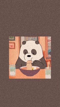 a panda bear eating food from a bowl