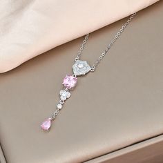 ✰ Elevate your elegance with our exquisite collection of the camellia long tassel teardrop pendant necklace. Each piece is designed to reflect timeless elegance and sophistication.  ✰  The camellia tassel teardrop pendant necklace adds a touch of delicate charm with its floral design and flowing tassels, perfect for special occasions.The radiant cut CZ necklace captures light beautifully, making it a standout piece for evening wear. The rose flower chain brings a romantic touch, ideal for both casual and formal settings.  ✰ Adorned with sparkling pink zircon and yellow diamond accents, these necklace are the epitome of elegance. Whether you're attending a wedding, a gala, or simply looking to add a touch of glamour to your daily wear, these necklace are sure to make you shine. Ideal as a g Elegant Pink Dangle Necklaces, Pink Zircon, Flower Chain, Cz Necklace, Necklace Rose, Flower Pendant Necklace, Teardrop Pendant, Radiant Cut, Yellow Diamond