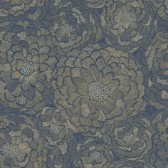 a blue and gold floral wallpaper with large flowers on the top, in an ornate pattern