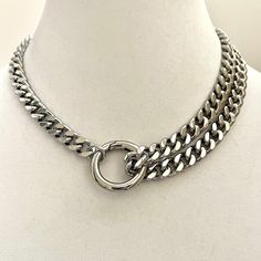 Silver Miami Cuban Chain Necklace is a high quality Cuban/Curb chain.  Chunky and thick. Great weight and sits beautifully around the neck.  The double strand on the one side makes this a very stylish and edgy piece of jewelry. The chain is approximately 9mm wide . The Spring Ring approximately 35mm Material: Rhodium plated brass  Lead safe and nickel free.  This is a very special piece  and a perfect gift for a friend, girlfriend, wife or even just for yourself:) Also available in Gold. Please check out the listing in my shop. Tips to keep your jewelry looking good. 1) Keep jewelry away from water and chemicals. 2) Remove during physical activities. 3) Store separately in a soft pouch or airtight box. 4) Avoid wearing to bed. 5) Gently polish with a soft, lint-free cloth to clean. PACKAGI Clear Sea, Boho Jewels, Cuban Chain Necklace, Sterling Necklace, Friend Girlfriend, Chunky Chain Necklaces, Miami Cuban, Chunky Jewelry, Sea Glass Necklace