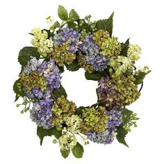 a wreath with purple and green flowers on it