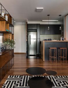 an instagram photo of a kitchen and living room