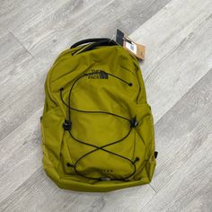 The North Face Jester Backpack Knapsack Sulphur Olive Green Brand New Green Backpack With Adjustable Strap For Outdoor Activities, Green Outdoor Backpack With Adjustable Strap, Casual North Face Outdoor Bags, Functional Yellow Backpack With Adjustable Strap, Yellow Nylon Bag For Outdoor, Yellow Bag With Adjustable Strap For Outdoor, Yellow Outdoor Bag With Adjustable Strap, Functional Yellow Bags For Outdoor, Functional Yellow Bag For Outdoor